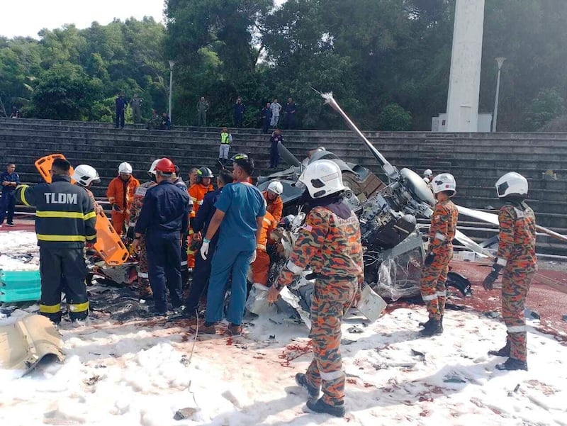 The victims included three women and seven men, police said (Fire & Rescue Department of Malaysia via AP)