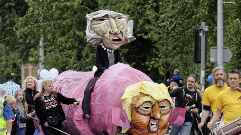 Effigies of US president Donald Trump and British Prime Minister Theresa May at the F&eacute;ile an Phobail parade in west Belfast. Picture by Cliff Donaldson 