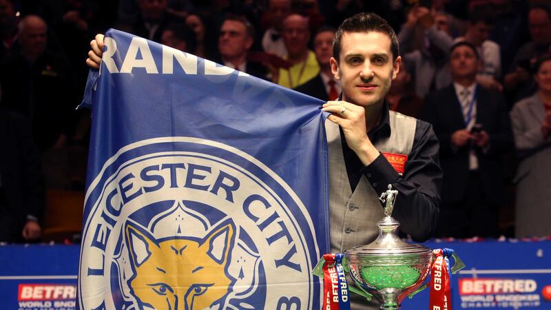 Mark Selby shows where his football allegiances lie after his victory in Monday night's World Snooker Championship final at the Crucible<br />Picture by PA&nbsp;