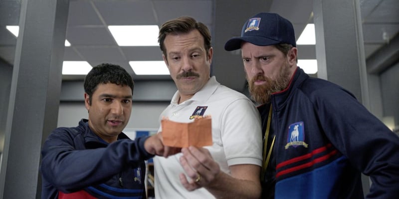 Nick Mohammed as Nathan, Jason Sudeikis as Ted Lasso and Brendan Hunt as Coach Beard in Ted Lasso 