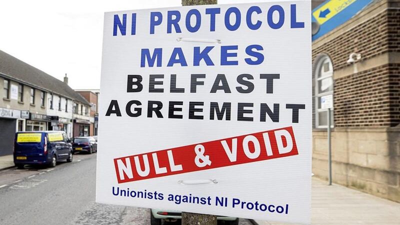 A sign by unionists against NI Protocol on Main Street in Larne. Picture by Liam McBurney/PA Wire 