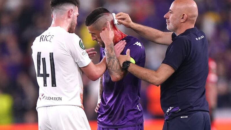 West Ham have been charged after fans threw objects onto the pitch, injuring Fiorentina captain Cristiano Biraghi (Tim Goode/PA)