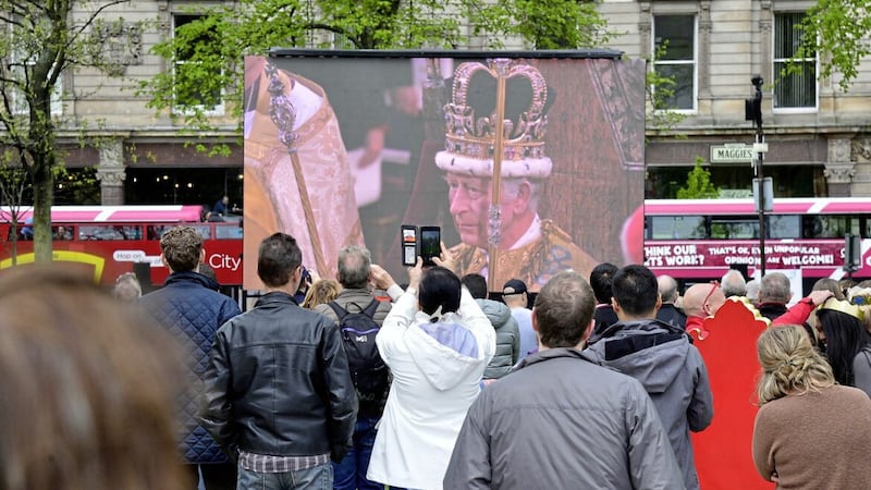 Crowds gathered at Belfast City Hall to watch live coverage of the coronation on May 6. Picture By: Arthur Allison/Pacemaker 