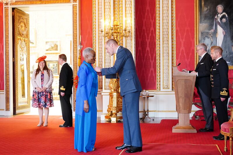 Claudette Johnson was honoured with an MBE by the Prince of Wales at Buckingham Palace in June 2022
