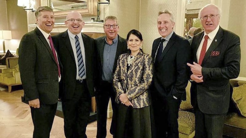 MLA Paul Frew, councillor ohn Finlay, MP Sammy Wilson, Conservative MP Priti Patel, MP Ian Paisley Jnr and MP Jim Shannon at DUP gala dinner at the Galgorm Resort in February that was sponsored by Belfast International Airport. 