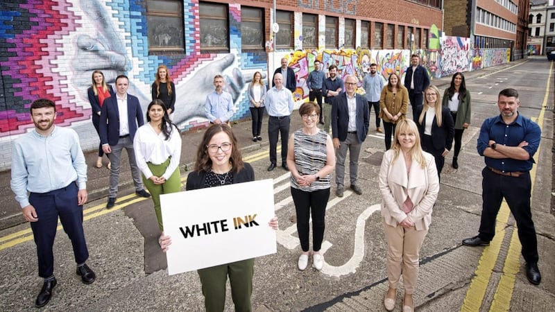 White Ink employees outside their Belfast headquarters. Picture: Brian Morrison 