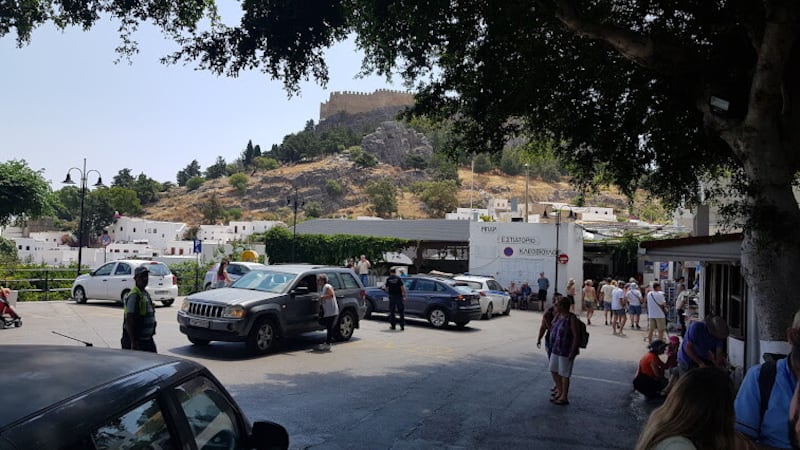 In the square outside Lindos, with the acropolis on the hillside above