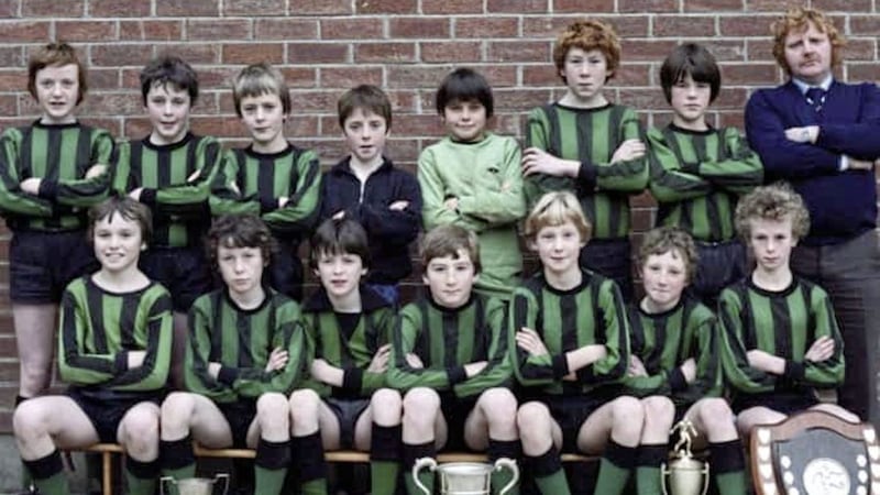 The All Saints, Ballymena Primary School side which won the Telegraph Cup in 1980. Back row, left to right: Liam Davey, Mark Molloy, Cormac McWilliams, Joe Crawford, Shane O&#39;Neill, Terry Lyness, and Charles McQuillan, Mr Shaun McLaughlin RIP; front row, left to right: Patrick Hughes, John McCann, Colin Gormley, Eamon McMahon (capt.), Ryan Toal, Martin Higgins, and Michael O&#39;Neill.  