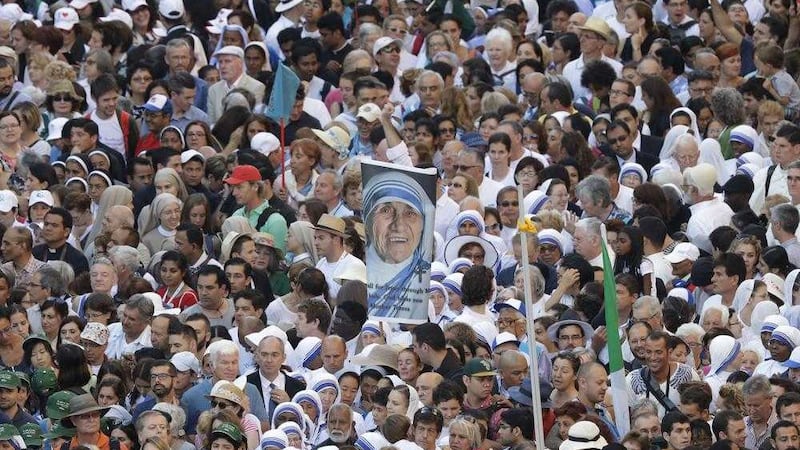 Faithful and pilgrims wait to enter in St Peter's Square at the Vatican for the canonization of Mother Teresa. Picture by Alessandra Tarantino, Associated Press