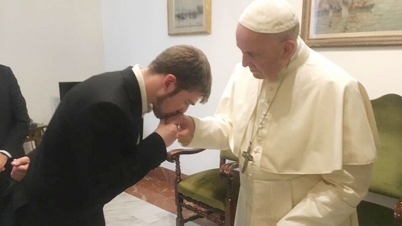 Tom Evans, the father of Alfie Evans, kisses Pope Francis' hand in the Vatican. Photo: Alfie's Army/Facebook