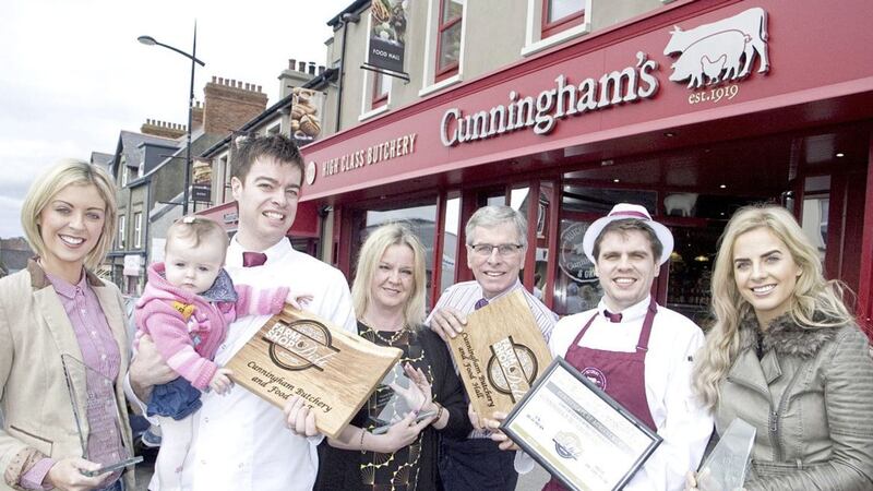 Three generations of the Cunningham family outside the recently expanded premises of Cunningham Butchers in Kilkeel. Donna Cunningham, her husband James Cunningham Jnr and their daughter Charlotte are pictured with Bernadette and James Cunningham Snr, their son Christopher and daughter Nicole. 