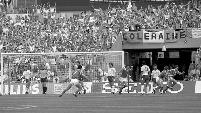 12 June 1988; Republic of Ireland's Ray Houghton, right, celebrates his goal with team-mates Ronnie Whelan, left, as John Aldridge and Paul McGrath run to join the celebrations, while England's, from left to right, Neil Webb, goalkeeper Peter Shilton, Tony Adams, captain Bryan Robson, John Barnes and Kenny Samson claim for an offside. European Championship Finals 1988, Group B, Republic of Ireland v England, Neckarstadion, Stuttgart, Germany. Picture credit: Ray McManus / SPORTSFILE.