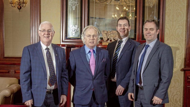 Chairman of Peaceful Futures South Armagh Eugene Reavey, journalist Eamonn Mallie, Newry businessmen John Young and Anthony Reavey preparing Friday&#39;s conference. 