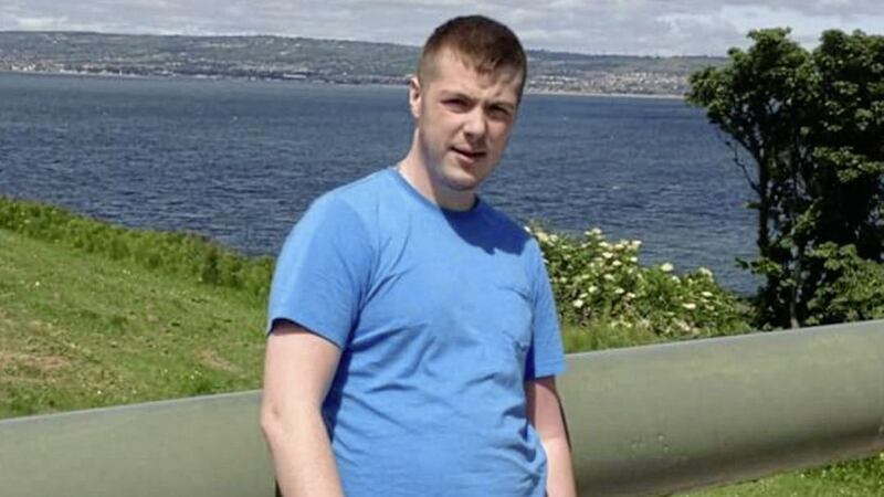 Conor Moore (24) was found dead at his home in Lenadoon 