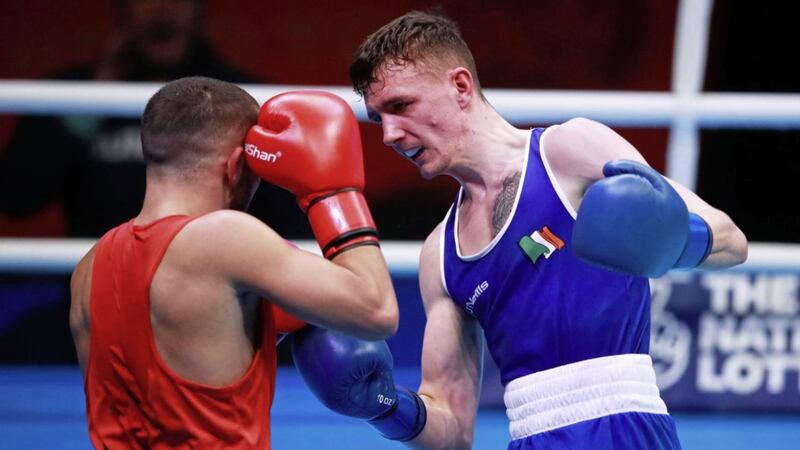 Belfast flyweight Brendan Irvine booked his place at the Tokyo Olympics with victory over Hungary&#39;s Istvan Szaka - just hours after it was confirmed the qualifier would be postponed after that evening&#39;s action. Picture by PA 