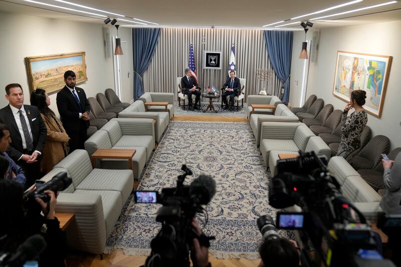 US secretary of state Antony Blinken, centre left, and Israel’s President Isaac Herzog, centre right, at the President’s Residence in Jerusalem (Mark Schiefelbein, Pool/AP)