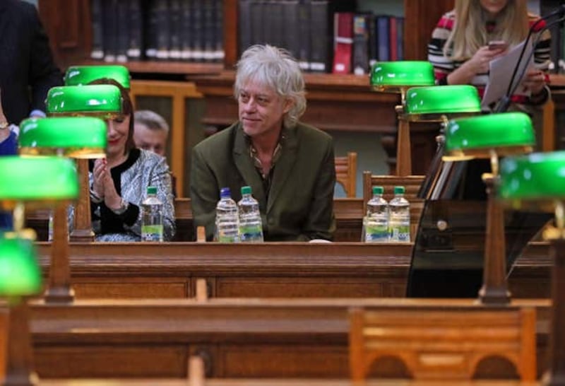 Sir Bob Geldof at the National Library of Ireland (NLI) in Dublin with Minister for Culture Josepha Madigan and library director Dr Sandra Collins, as he announced that the Band Aid Trust is donating its archive (Brian Lawless/PA)
