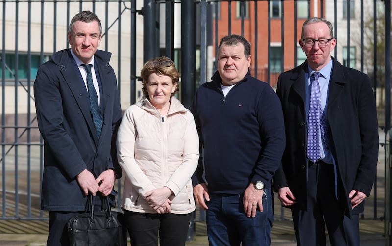 Siblings Bernie McKearney and Paddy Fox (Centre) pictured with their legal representatives Gavin Booth and Peter Corrrigan.
Bernie McKearney's husband Kevin and his uncle John McKearney were shot at their family butcher shop in Moy, County Tyrone, in January 1992.
Nine months later Mrs McKearney's parents Charles and Teresa Fox were killed in their home in Moy.
PICTURE COLM LENAGHAN