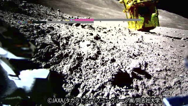 This image provided by the Japan Aerospace Exploration Agency shows an image taken by a Lunar Excursion Vehicle 2 (LEV-2) of a robotic moon rover called SLIM on the moon (JAXA/Takara Tomy/Sony Group Corporation/Doshisha University via AP)