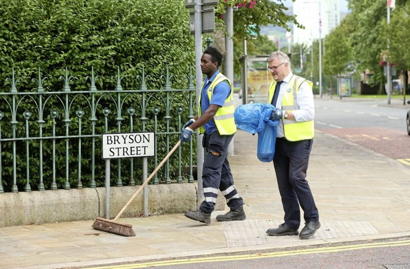 Council workers clean up in east Belfast after a night of trouble. Picture by Mal McCann 