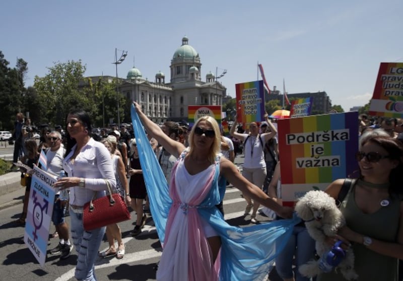 People dance during the gay pride parade in Belgrade