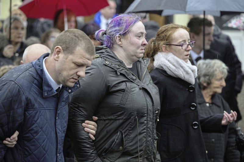 Brooke&#39;s heartbroken mother, Martha, is comforted by mourners at the funeral yesterday. Picture by Hugh Russell. 
