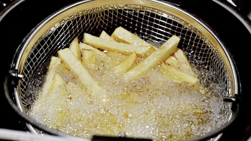 Chips being cooked in a household fat fryer. Picture by Nick Ansell, Press Association 