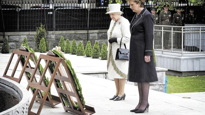 Queen Elizabeth and President Mary McAleese pause after laying wreaths at the Garden of Remembrance in Dublin city centre which honours all those who fought for Irish freedom from British rule. Picture by Arthur Edwards/The Sun/PA Wire 