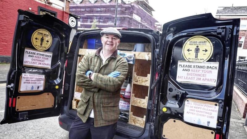 Seamas Delaney, head chef at Hatfield House on the Ormeau Road in south Belfast, with the bar&#39;s new Guinness delivery van 