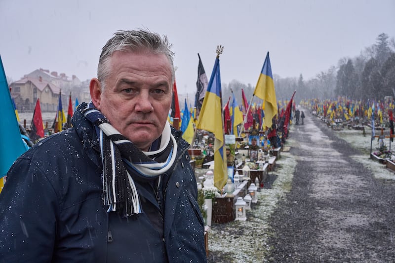 Veteran journalist Kevin Magee in the military cemetery Lviv in Ukraine as part of the new TG4 documentary