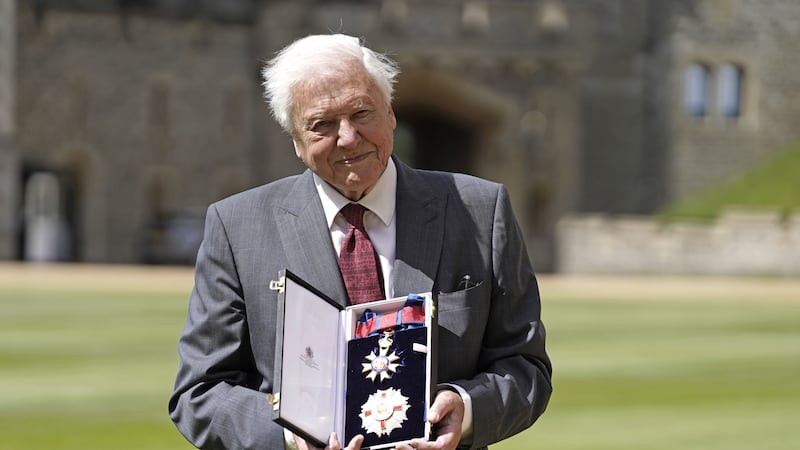 The environmentalist and broadcaster, first knighted by the Queen in 1985, collected the even more prestigious honour from her son, Charles.
