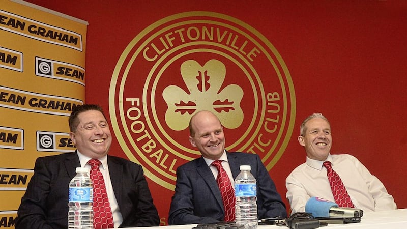 New Cliftonville manager Barry Gray, Chairman Gerard Lawlor and Assistant Manager Harry Fay are all smiles after Gray&#39;s appointment was announced last night. Picture: Arthur Allison. 