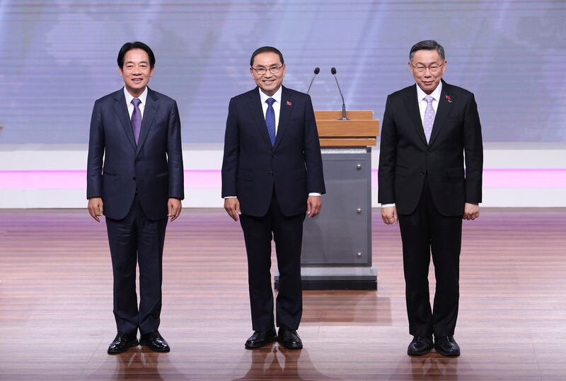 (L to R) Democratic Progressive Party presidential candidate William Lai, China-friendly Kuomintang Party candidate Hou Yu-ih, and Taiwan People’s Party candidate Ko Wen-je (Pei Chen/Pool/AP)