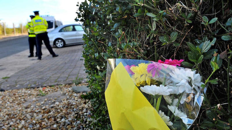 Flowers at the scene of the murder-suicide which claimed the life of Garda Tony Golden. Picture by Justin Kernoghan
