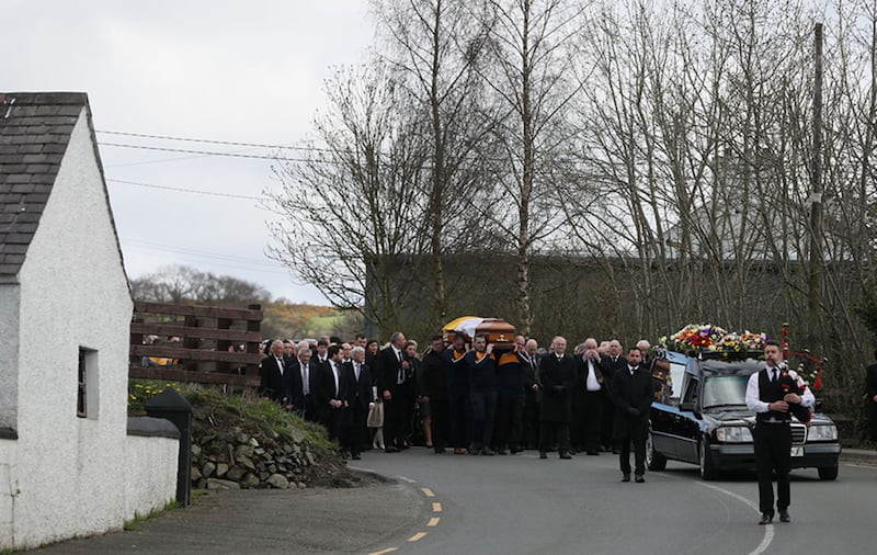 The funeral cortege makes it way to Saint Patrick's Church in Oram, County Monaghan, for the funeral of country music star Big Tom McBride&nbsp;