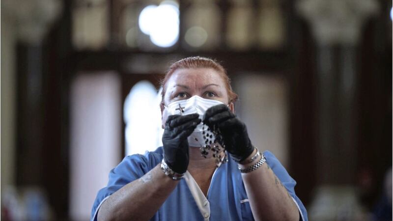 Care worker Mary McDonough at Clonard after the church reopened for private prayer. Picture by Hugh Russell 