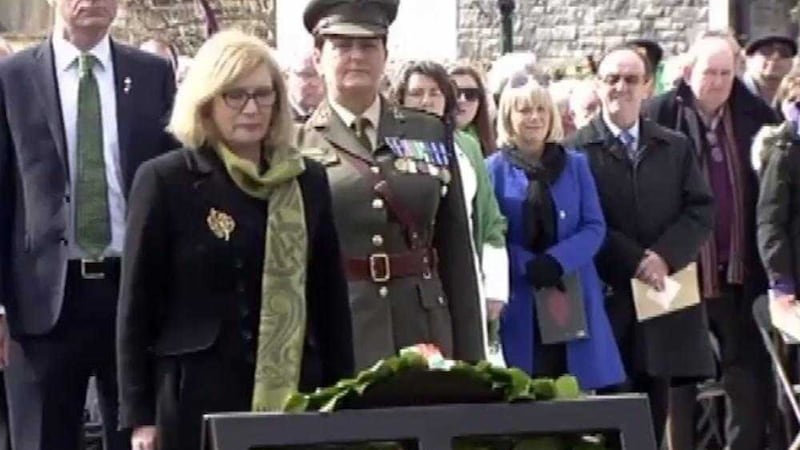 The Republic&#39;s education minister Jan O&#39;Sullivan lays a wreath in Athenry, Co Galway 