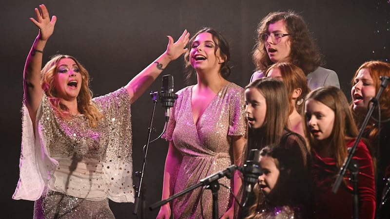 Charlotte with the choir (James Veysey/Shutterstock)