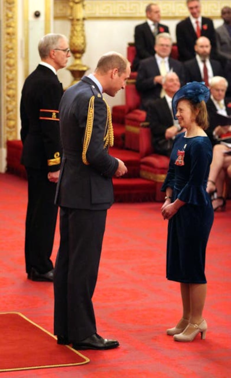 Sarah Gordy talks to William at Buckingham Palace