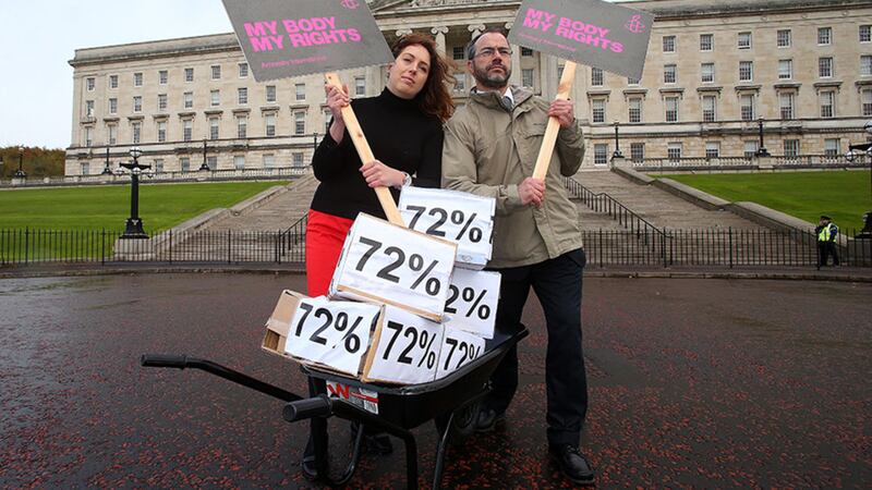 Amnesty International&rsquo;s Patrick Corrigan and Adrianne Peltz deliver a 45,000-strong petition to Stormont calling for abortion law reform. Picture Mal McCann&nbsp;