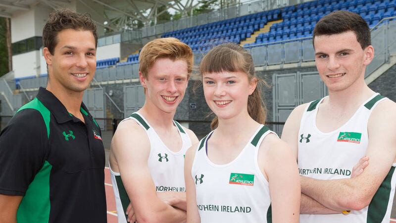 Tom Reynolds (Athletics NI coach) with Commonwealth Youth Games-bound&nbsp;athletes Ben Fisher and Lydia Mills. Ois&iacute;n O&rsquo;Callaghan (right) was also selected for the trip to Somoa, but has had to withdraw through injury