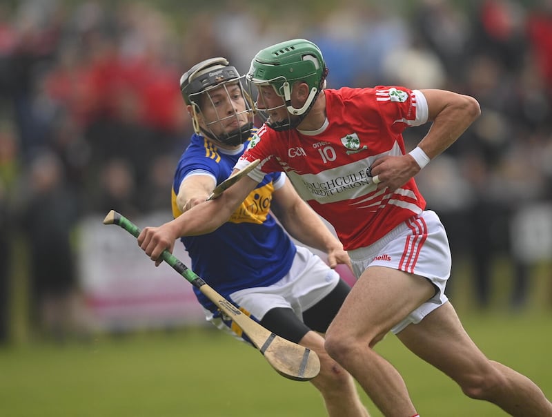 Paul Boyle (right) in previous championship action for Loughgiel against Rossa.