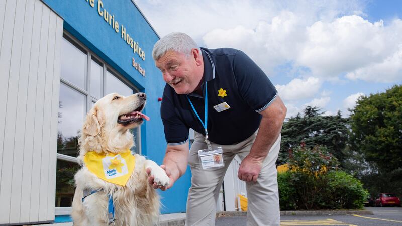 Dog Sandi and her owner Alistair King are boosting the spirits of Marie Curie patients (Phil Smyth/Marie Curie/PA)