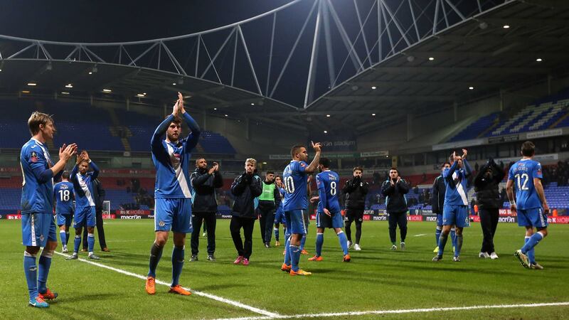 Eastleigh's players applaud their supporters after the final whistle during the Emirates FA Cup third round replay at the Macron Stadium in Bolton<br />Picture by PA&nbsp;