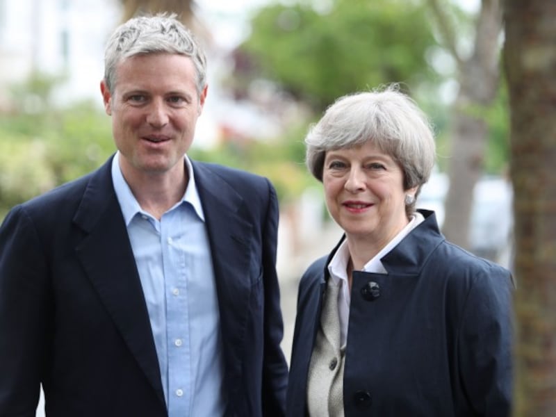 Theresa May, who has been campaigning with Zac Goldsmith, laid out plans to tackle domestic child abuse (Steve Parsons/PA)