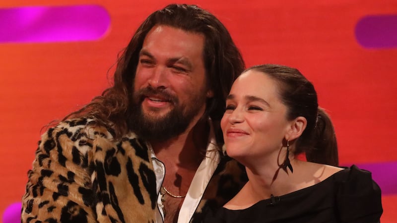 A picture of them showed Momoa holding Clarke in the air.