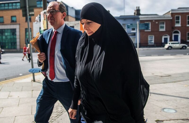 Alleged IS member Lisa Smith leaving Dublin District Court with her solicitor Peter Corrigan. Picture by Brian Lawless, Press Association