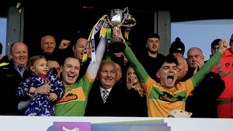 Dunloy&#39;s Paul Shiels and Ryan Elliott celebrate with the Four Seasons Cup after yesterday&#39;s Ulster final victory over Slaughtneil in Armagh. Picture by Seamus Loughran 