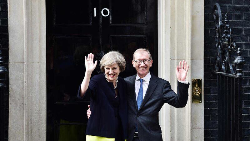 New Prime Minister Theresa May and her husband Philip outside 10 Downing Street. Picture by Ben Birchall, Press Association