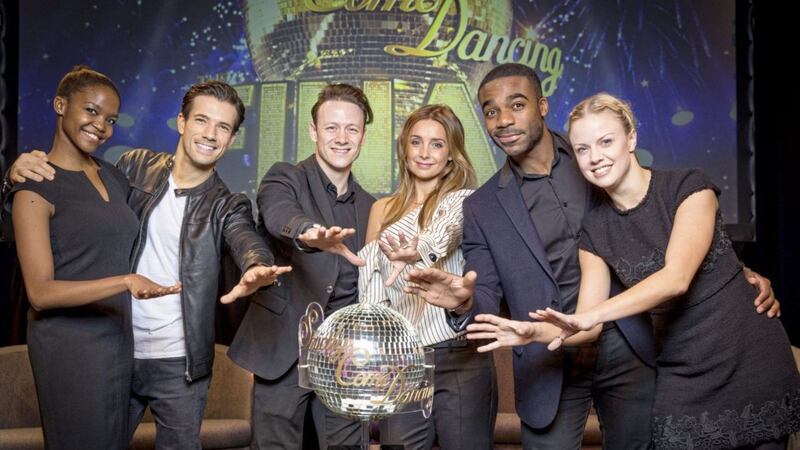 Oti Mabuse, Danny Mac, Kevin Clifton, Louise Redknapp, Ore Oduba and Joanne Clifton with the glitterball trophy ahead of the Strictly final tonight Picture by Guy Levy/BBC/PA 